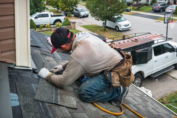 Professional Roofing technician working in Huntington, MA